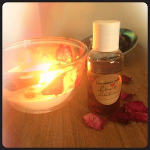 Rose body oil with real rose petals.